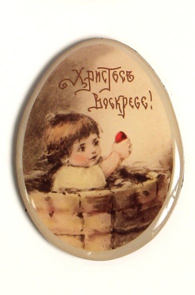 Утварь и подарки Магнит пасхальный (ребенок держит яйцо)
